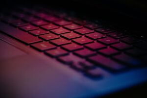 a-close-up-of-a-keyboard-with-a-blurry-background